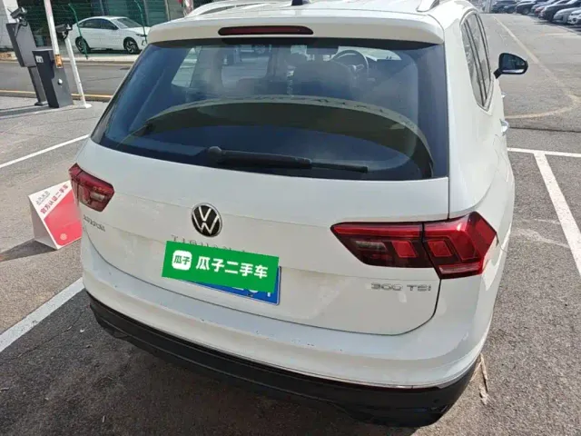Volkswagen Tiguan L — Фото автомобиля 5