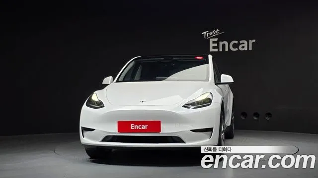 Tesla Model Y — Фото автомобиля 3