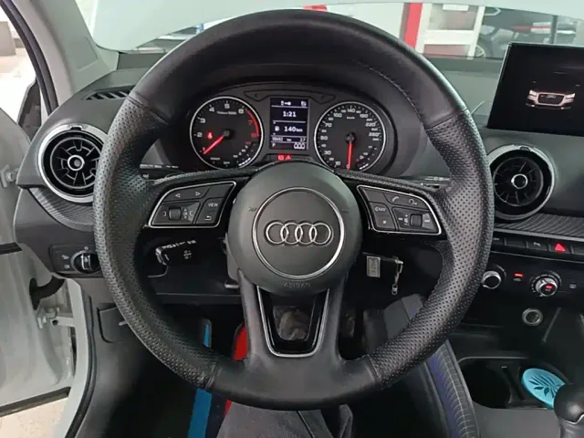 Audi Q2L — Фото автомобиля 10