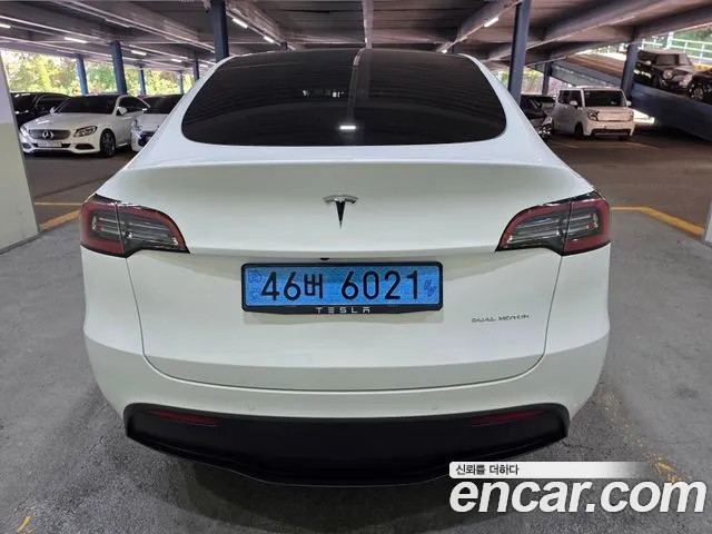 Tesla Model Y — Фото автомобиля 7