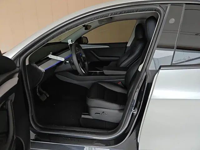 Tesla Model Y — Фото автомобиля 15