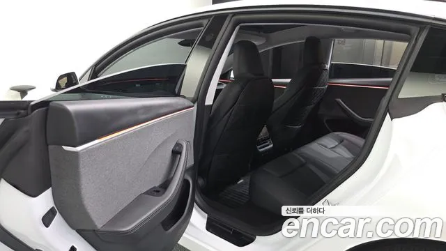 Tesla Model 3 — Фото автомобиля 21