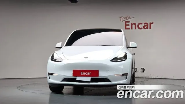 Tesla Model Y — Фото автомобиля 3