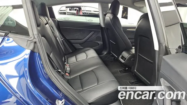 Tesla Model 3 — Фото автомобиля 9