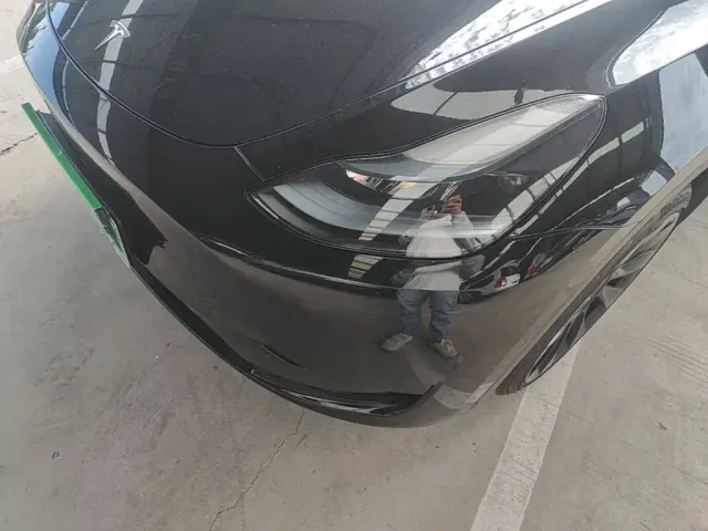 Tesla Model Y — Фото автомобиля 23