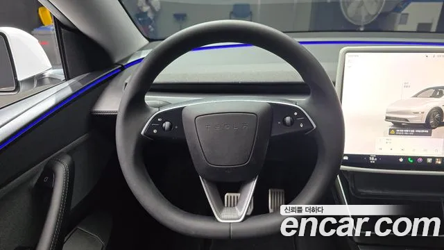 Tesla Model Y — Фото автомобиля 13