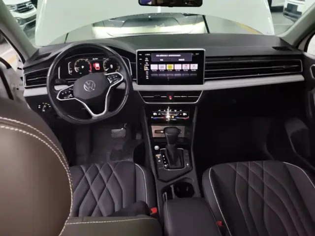 Volkswagen Tiguan L — Фото автомобиля 9