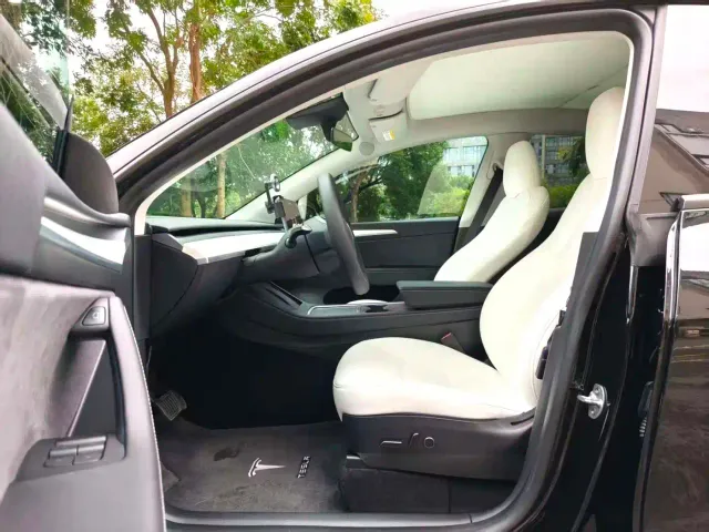 Tesla Model Y — Фото автомобиля 8