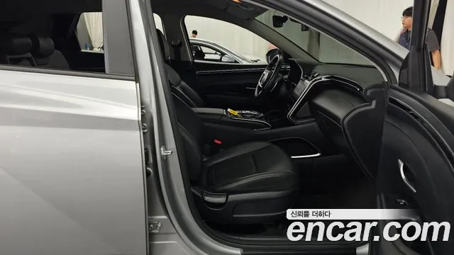 Hyundai Tucson Tucson (NX4) Бензин 1.6 турбо 2WD — Фото автомобиля 11
