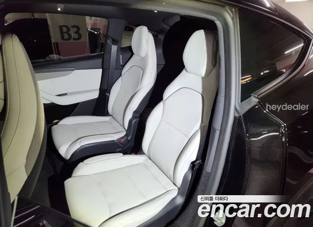 Tesla Model Y — Фото автомобиля 7