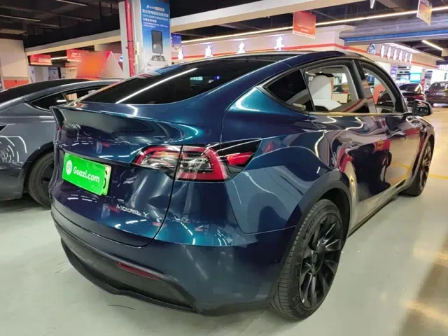 Tesla Model Y — Фото автомобиля 6