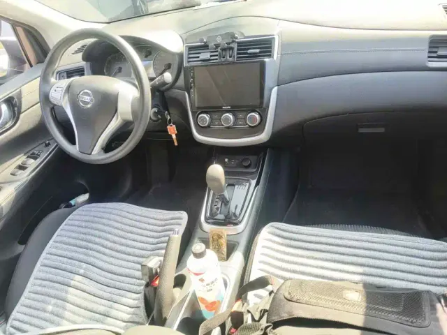 Nissan Tiida — Фото автомобиля 12
