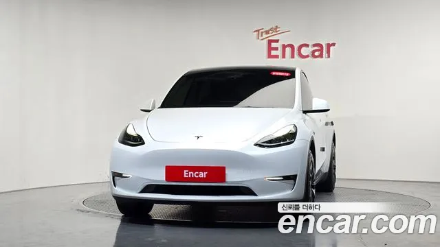 Tesla Model Y — Фото автомобиля 3