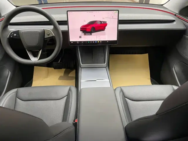 Tesla Model Y — Фото автомобиля 12