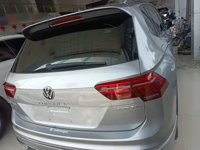 Volkswagen Tiguan L — Фото автомобиля 5