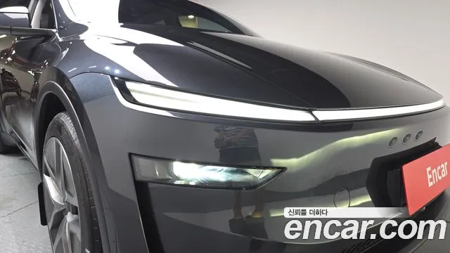 Tesla Model Y — Фото автомобиля 18