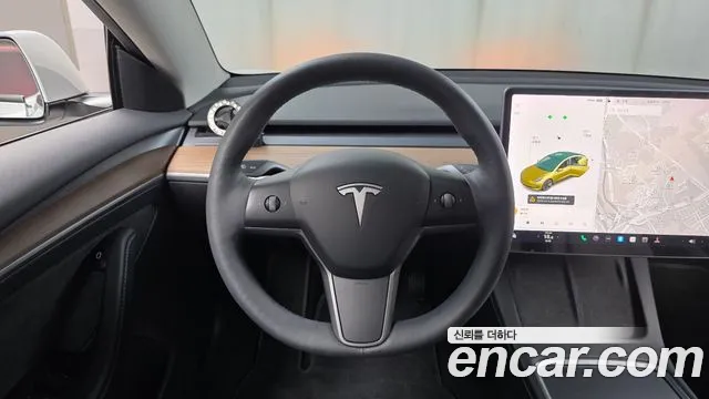 Tesla Model 3 — Фото автомобиля 14