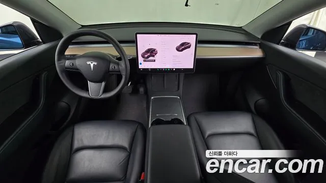 Tesla Model Y — Фото автомобиля 7