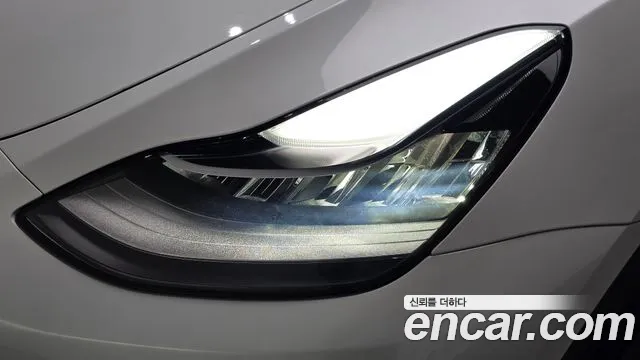 Tesla Model Y — Фото автомобиля 7