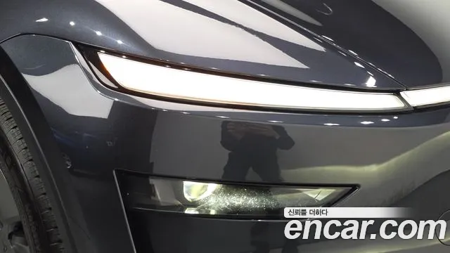 Tesla Model Y — Фото автомобиля 7