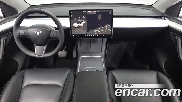 Tesla Model Y — Фото автомобиля 10