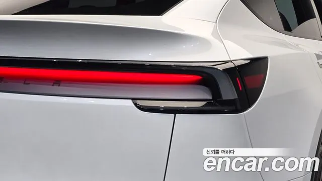 Tesla Model Y — Фото автомобиля 8