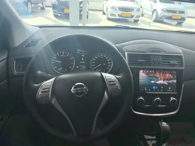 Nissan Tiida — Фото автомобиля 5
