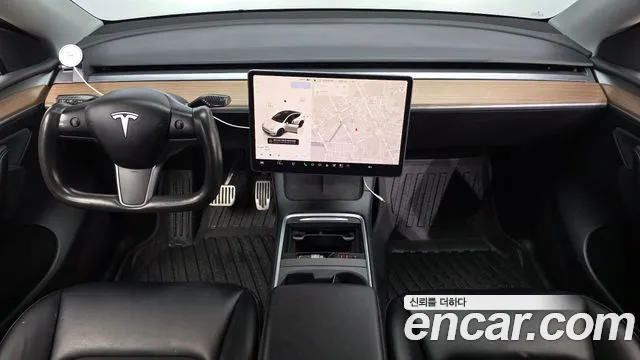 Tesla Model Y — Фото автомобиля 10