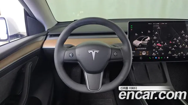 Tesla Model Y — Фото автомобиля 19