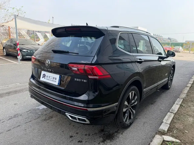 Volkswagen Tiguan L — Фото автомобиля 3
