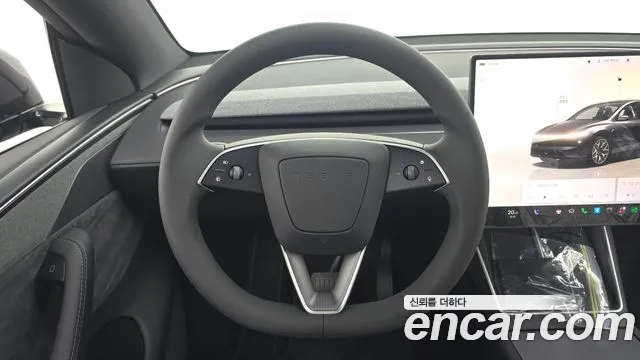 Tesla Model Y — Фото автомобиля 12