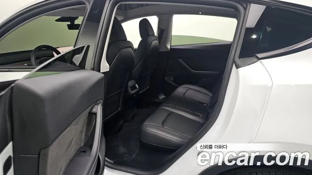 Tesla Model Y — Фото автомобиля 22