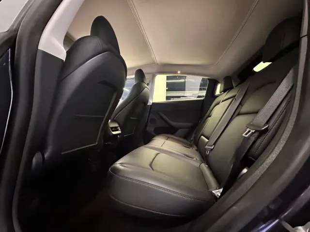 Tesla Model Y — Фото автомобиля 15
