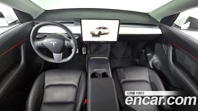 Tesla Model Y — Фото автомобиля 4