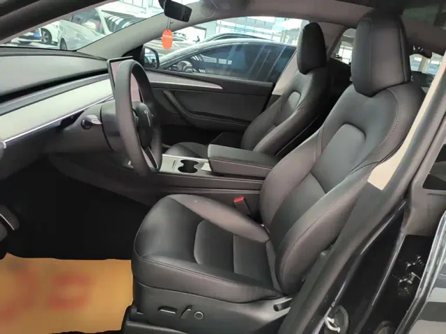 Tesla Model Y — Фото автомобиля 14