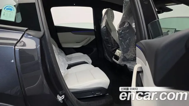 Tesla Model Y — Фото автомобиля 18