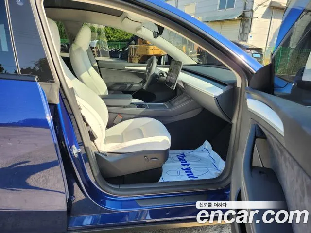 Tesla Model Y — Фото автомобиля 9