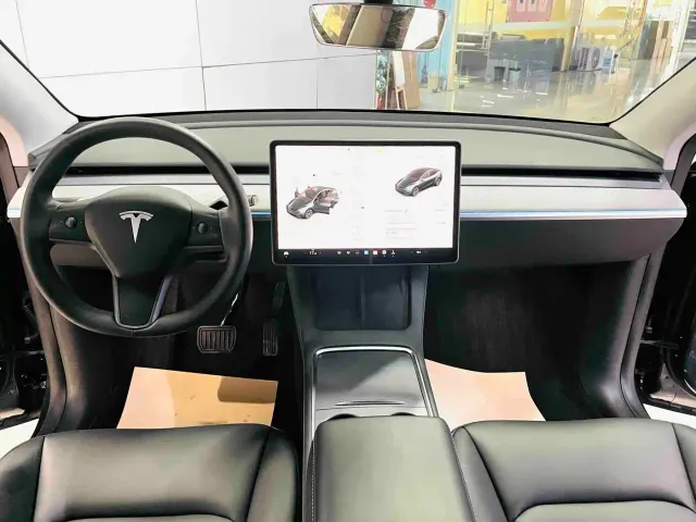 Tesla Model Y — Фото автомобиля 7