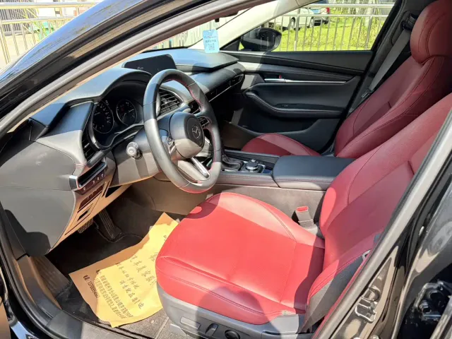 Mazda Axela — Фото автомобиля 7