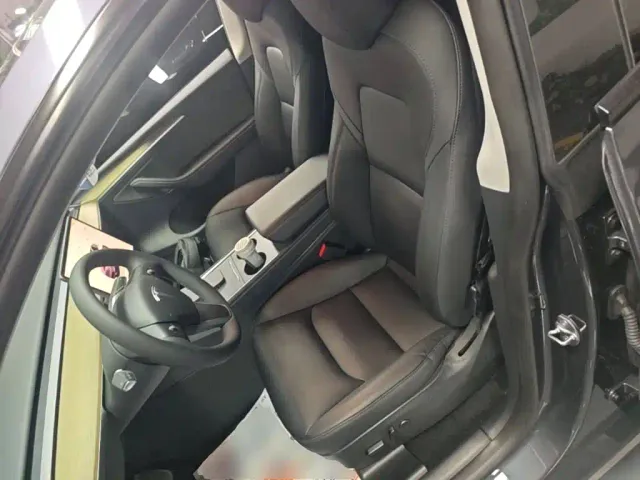 Tesla Model Y — Фото автомобиля 14
