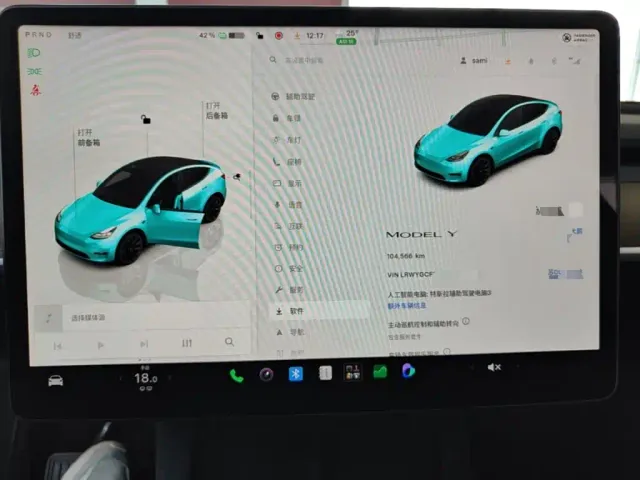 Tesla Model Y — Фото автомобиля 11