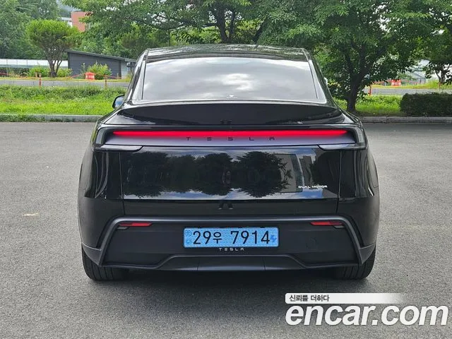 Tesla Model Y — Фото автомобиля 4