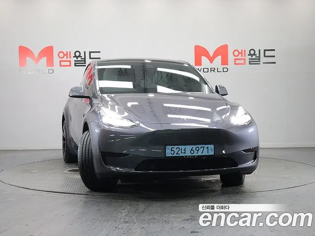 Tesla Model Y — Фото автомобиля 3