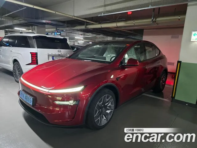 Tesla Model Y — Фото автомобиля 3