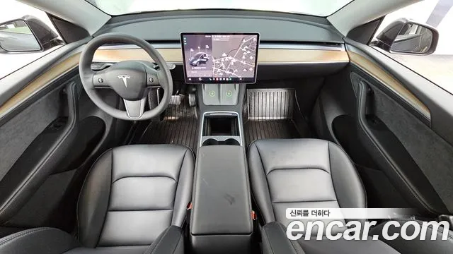 Tesla Model Y — Фото автомобиля 7