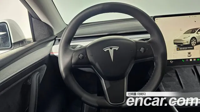 Tesla Model Y — Фото автомобиля 21