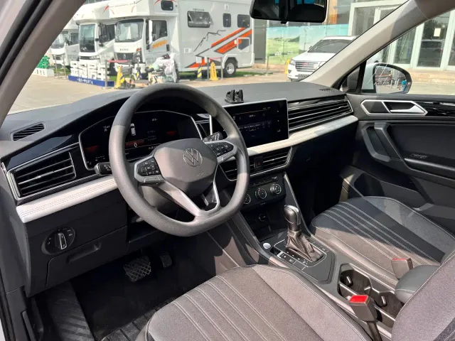 Volkswagen Tiguan L — Фото автомобиля 5