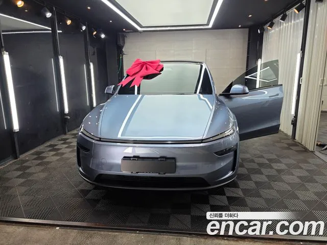 Tesla Model Y — Фото автомобиля 9