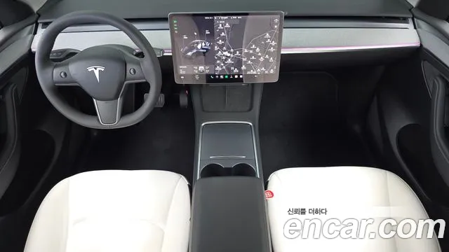 Tesla Model Y — Фото автомобиля 7
