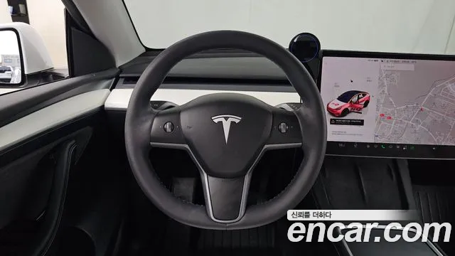 Tesla Model Y — Фото автомобиля 19